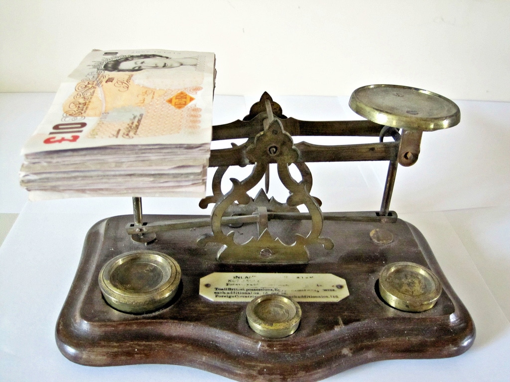 scales showing money