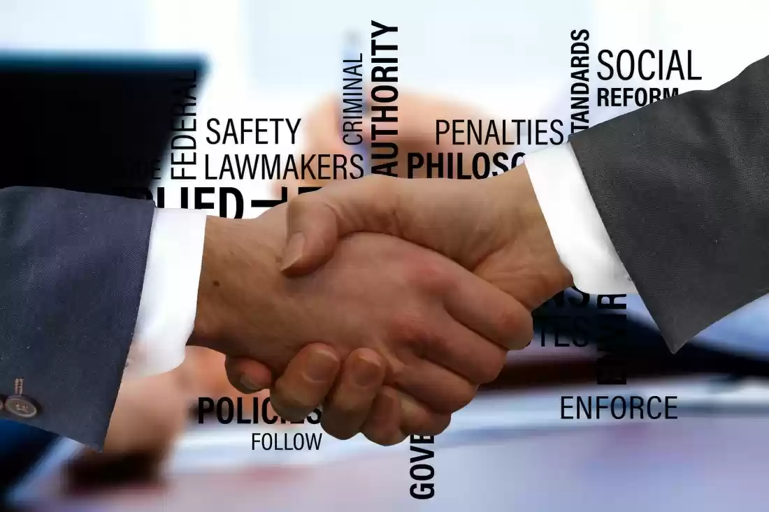 Musician and promoter signing a live gig contract