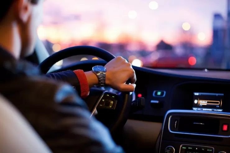 Musician driving to a gig at night