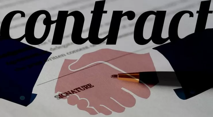 Musician signing a live gig contract