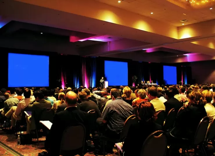 Corporate event with audience and stage lighting