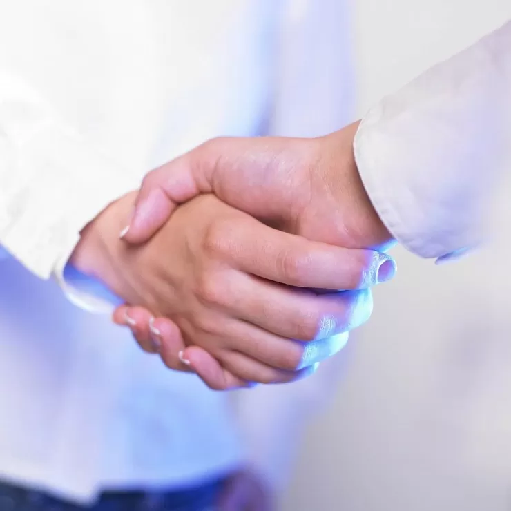 Professional handshake representing a business agreement