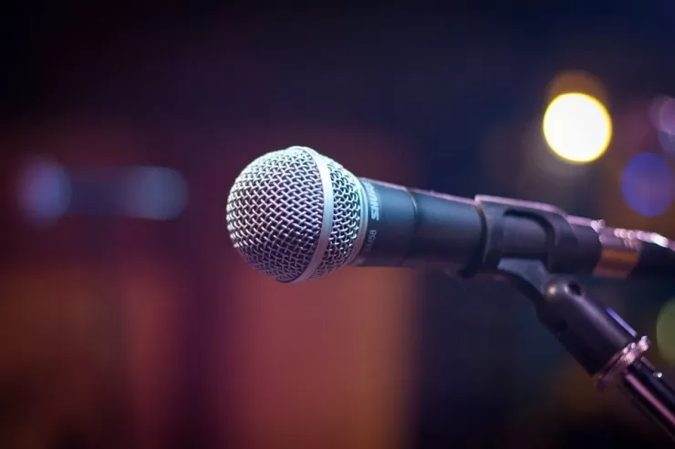 microphone on stage at an open mic night