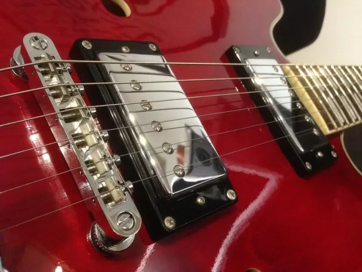 Red electric guitar close-up
