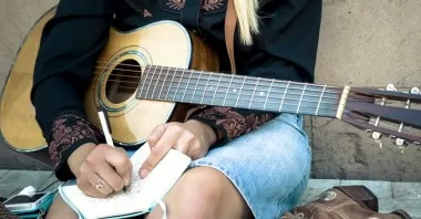 Songwriter writing music and overcoming writers block